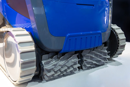 Automatic swimming pool floor maintenance cleaning robot