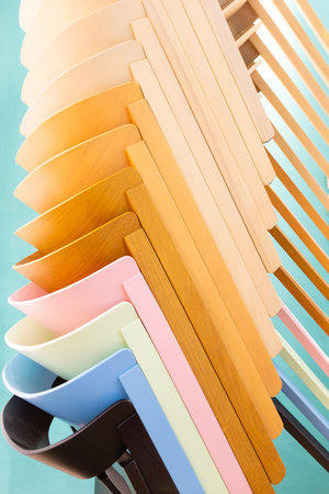 Multi-colored fashion chairs show off the stacked style.の写真素材