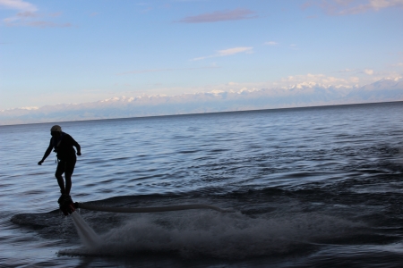 Attraction called the  iron man  passing on the waterの写真素材