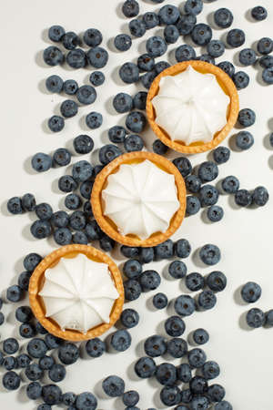 Cakes with blueberries isolated on white background.の写真素材
