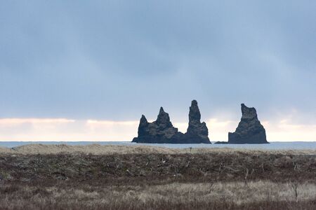 Reynisdrangar, the basalt sea stacks situated under the mountain Reynisfjall near the village of Vik, southern Icelandのeditorial素材