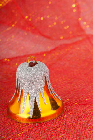 Christmas Decorations on red tulle bacgroundの写真素材