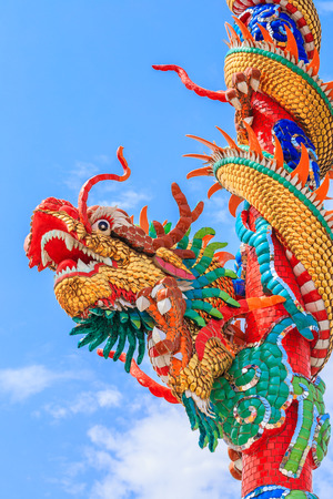 This colorful Chinese dragon on the pole image is taken from a public Chinese shrine.の写真素材