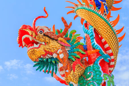 This colorful Chinese dragon on the pole image is taken from a public Chinese shrine.の写真素材