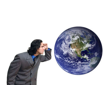 businessman staring into the globe