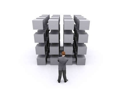businessman is staring at cubes and try to find a solutionの写真素材