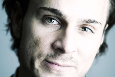 over exposed businessman face with some business blue color castの写真素材