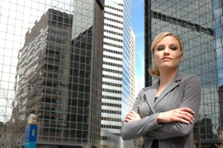 business woman is outside of business buildingsの写真素材