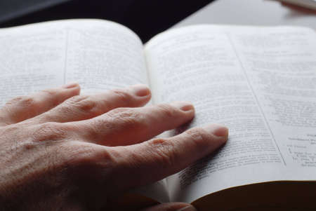 religious person is reading the holly bible