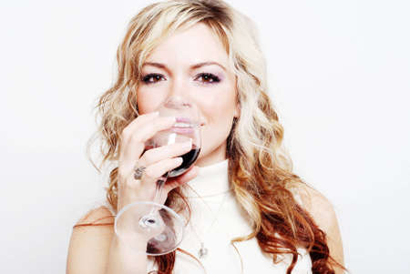 a sexy girl is having a drink and enjoying herself