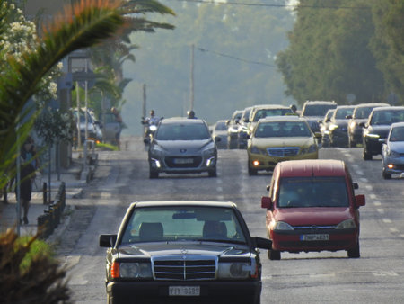 Telephoto pictures with cars on the seafront road of ATHENS Greece July 1st 2021の写真素材