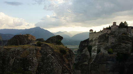 one of the beautiful monasteries of Meteora as we gaze from the Monastery of Barlaam looking southwestの写真素材