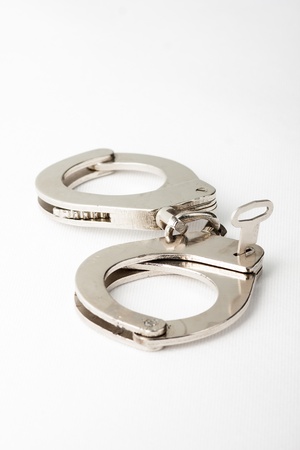 police handcuffs with keyの写真素材