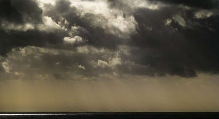 The sun starting to set over Camber Sands beach bringing out fabulous colours.