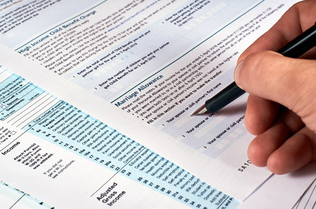 Tax reporting. Human completes the tax form