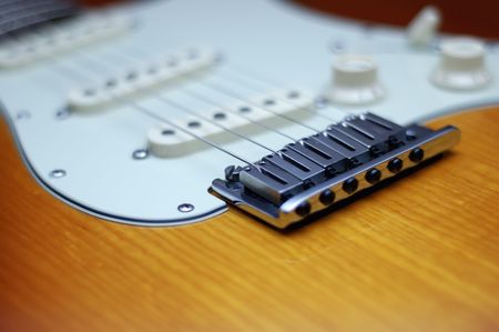 Close-up of a Fender American Deluxe guitar bridgeの写真素材