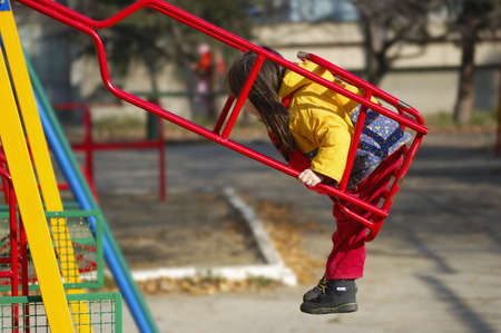 Stoped motion of a girl on a swings