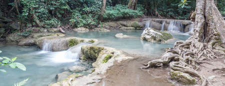 Deep forest waterfall at Erawan waterfall National Park Kanjanaburi Thailandの写真素材