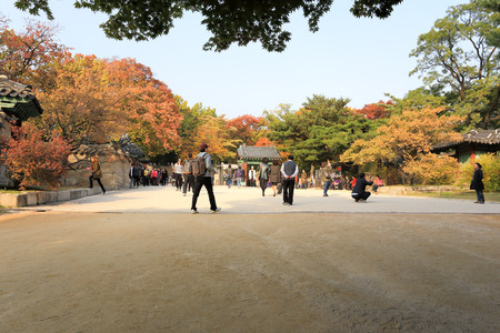 SEOUL, SOUTH KOREA - October 29, 2014 :Tourist visit at Changdeokgung palace, built by the kings of the Joseon Dynasty on October 29, 2014 in Seoul, South Koreaのeditorial素材