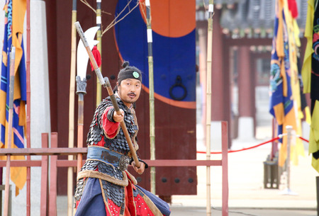 SUWON, SOUTH KOREA - October 30, 2014 : Korean soldier with traditional Joseon dynasty during show martail arts at Hwaseong haenggung square. Photo taken on October 30, 2014 in Suwon, South Koreaのeditorial素材