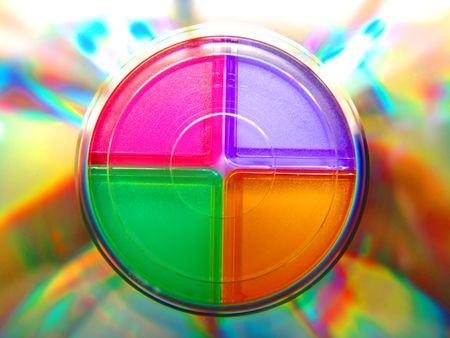 A CD with colored boxes behindの写真素材