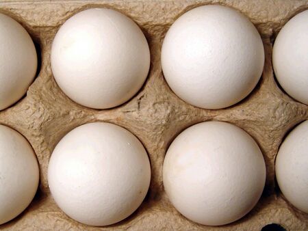 A closeup of eggs in a boxの写真素材