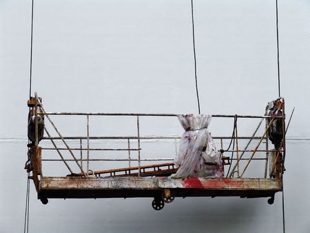 An elevator used for painting high buildings wallsの写真素材