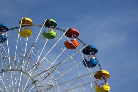 A colored ferris wheel in a children park
