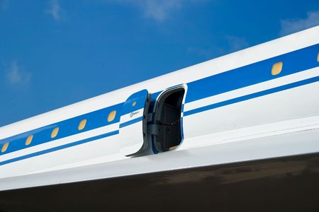 A plane side with an open doorの写真素材