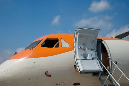 A plane side with an open doorの写真素材