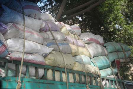 A truck loaded with sacks of goods in Cairo, Egyptのeditorial素材