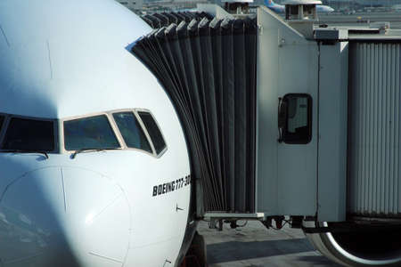 Front close view of a Boeing 777 plane docked in Dubai, UAE, february 2015のeditorial素材