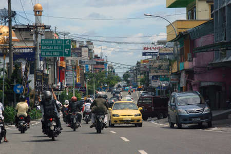 Street view and local life in the city of Pekanbaru, Indonesia, november 2013のeditorial素材