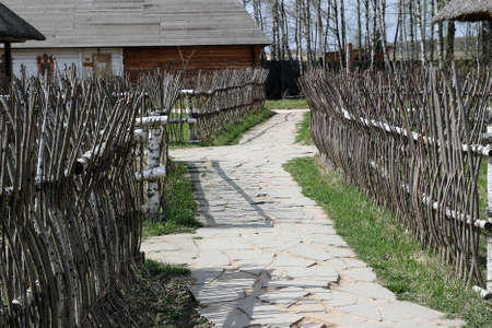 Traditional ukrainian fence made of wooden sticksの写真素材