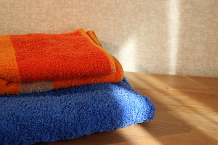 Closeup of a blue and orange towels with copy space on the rightの写真素材
