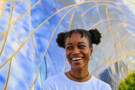 Portrait of a young african american woman smiling at the camera