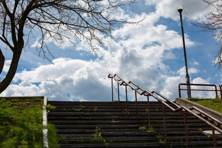 Stairs in the park with blue sky and white clouds background.の写真素材