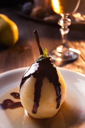 Delicious pear dessert with chocolate and amaretto liqueurの写真素材