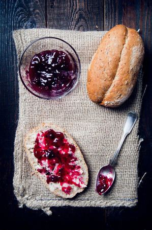 bun with sweet jam for breakfast