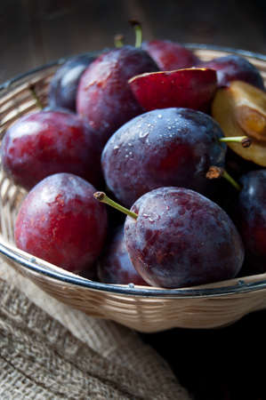 Basket full of autumn fruitsの写真素材