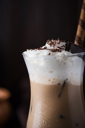 Iced coffee on wooden backgroundの写真素材