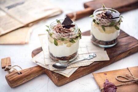 Granola with yoghurt on bright backgrounの写真素材
