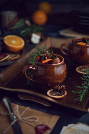 Warming mulled wine on dark backgroundの写真素材