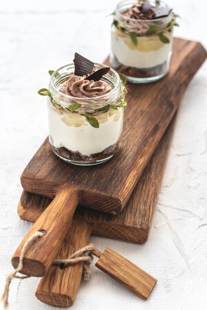 Granola with yoghurt on bright backgrounの写真素材