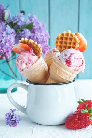 Strawberry ice cream on rural backgroundの写真素材