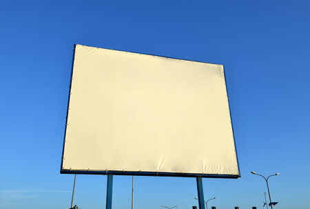 Outdoor white space for advertisement  Big blank billboard with blue sky の写真素材