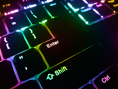 Low profile backlit keyboard. Rainbow colors backlight.の写真素材