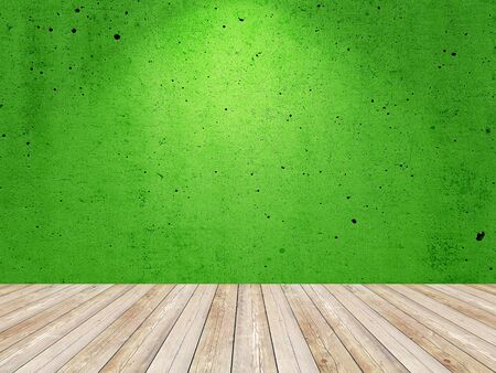 Empty painted green color wall with spotlight. Interior room background.の写真素材