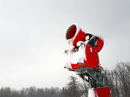 Snow cannon in winter sceneryの写真素材