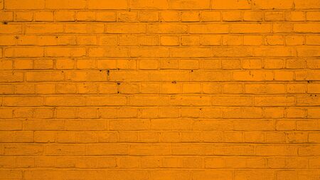 Wall brick orange background texture imageの写真素材